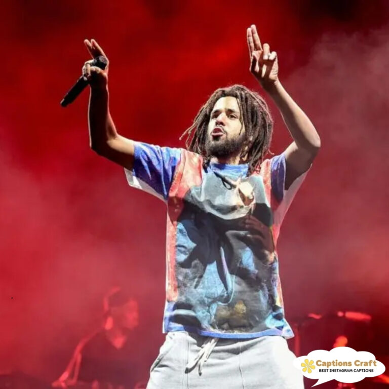 Rapper performing energetically on stage with a mic in hand.