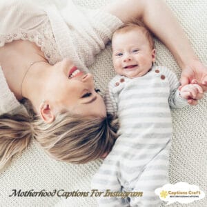 A mother and her smiling baby lie on a soft surface, sharing a joyful moment together.