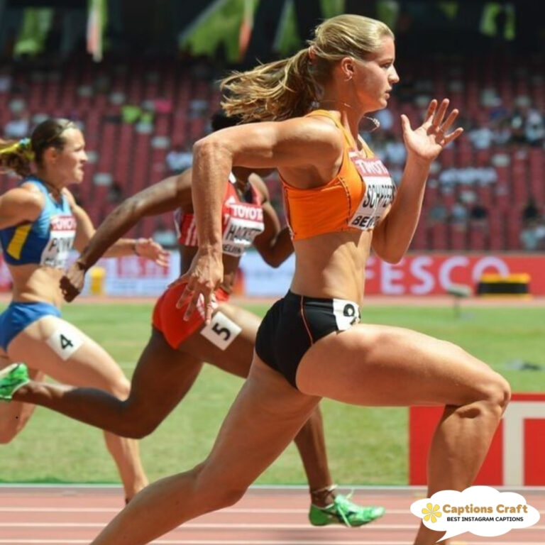 Female sprinter in mid-run, showcasing athleticism on the track.